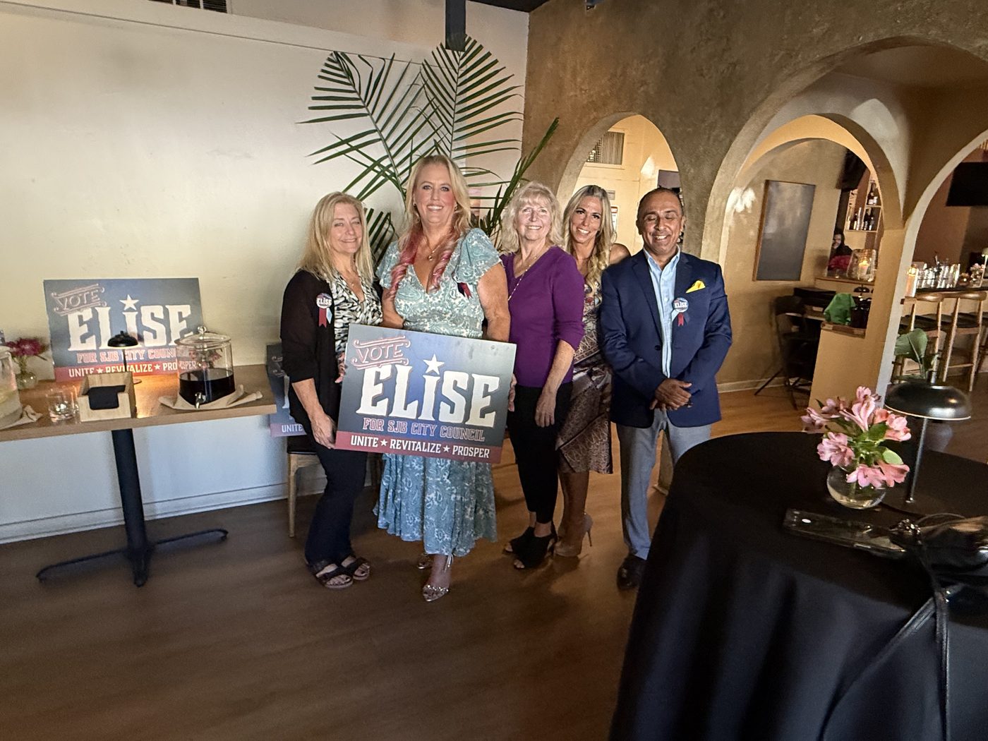 Five supporters with a Vote Elise for SJB City Council sign