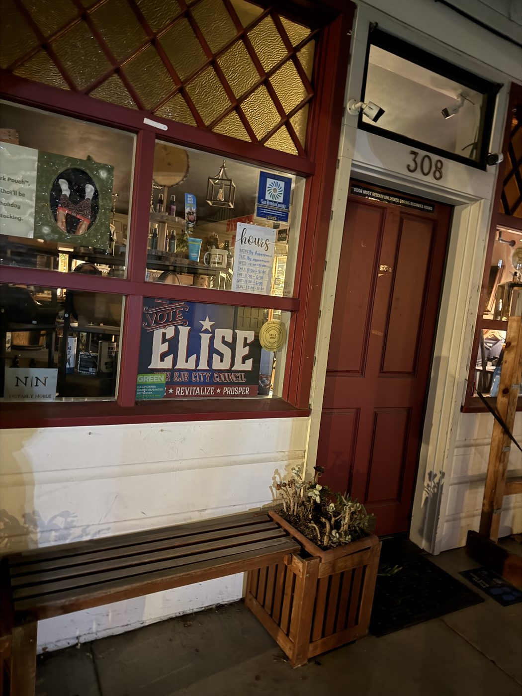 A Vote Elise sign in the window of a downtown San Juan Bautista shop