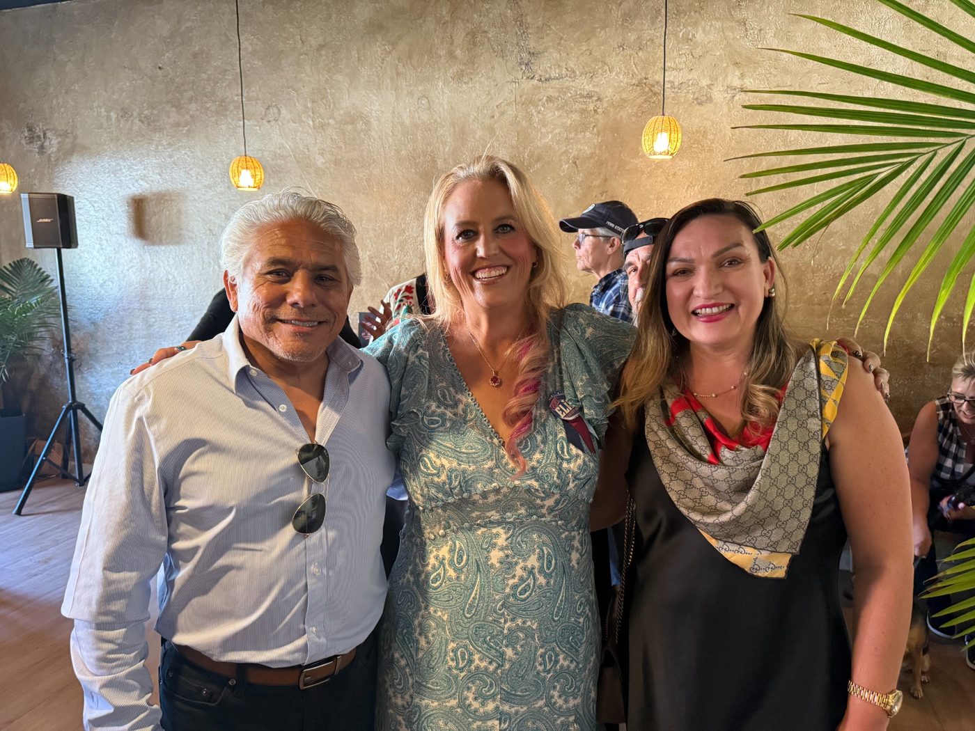 Elise Brentnall with two supporters at the campaign launch party